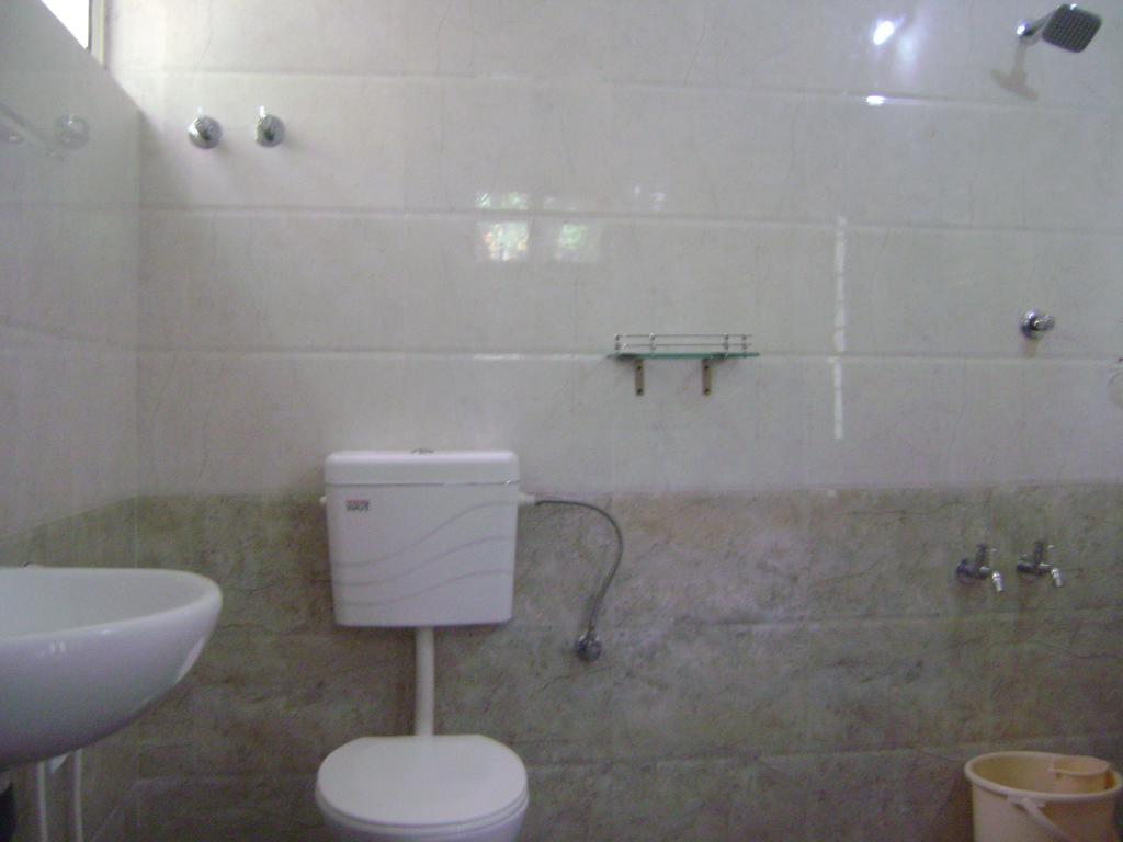 Ivory Coaste Hotel Kannur Bagian luar foto